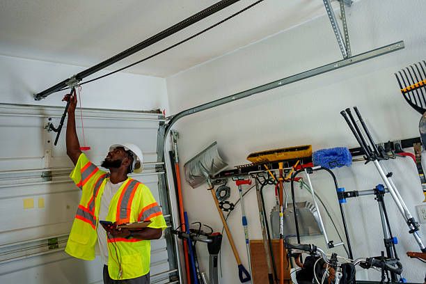 Professional Garage Door Installation technician working in Carmel Valley Village, CA